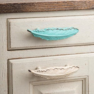 Vintage creatieve kasttrekker, veren design ladehandvat