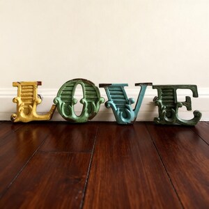 Tirador de armario vintage con 26 letras del alfabeto, herrajes para puertas de armarios y roperos.