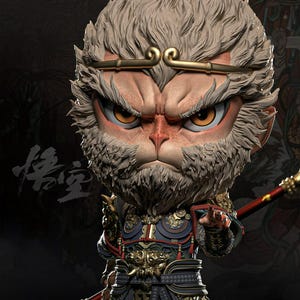 May include: A detailed figurine of a monkey-like character with an intense expression. The figure has a light brown face, gray fur, and wears ornate armor with gold accents. The character is holding a staff with red and gold details. The background is dark.