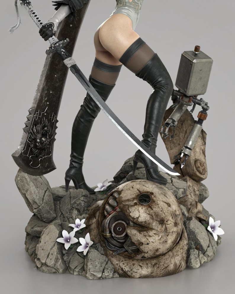 May include: A detailed collectible figurine featuring a character with long black high-heeled boots, a white bodysuit, and a large sword with a lion emblem. The figure stands on a rocky base with small white flowers and a mechanical robot component.