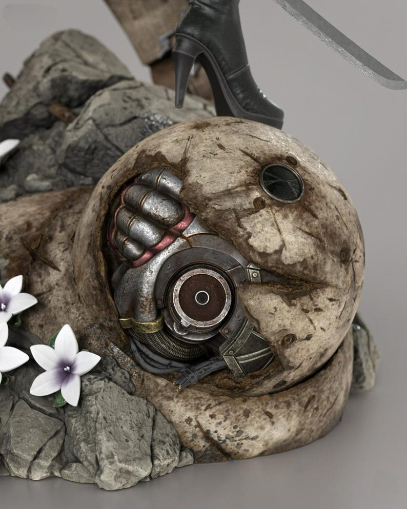 May include: A weathered, spherical robotic head with a cracked, beige, stone-like exterior revealing metallic internal gears, wires, and a central circular lens. The object is set on a rocky base with white flowers and a black high-heeled boot.