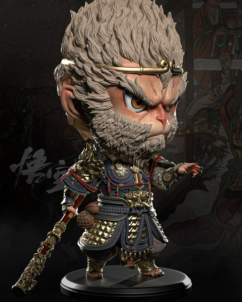 May include: A detailed figurine of a monkey-like character with an angry expression. The figure wears ornate armor in gold, blue, and black, and holds a staff. The character has light brown fur and a golden headband. The figurine is on a black base.