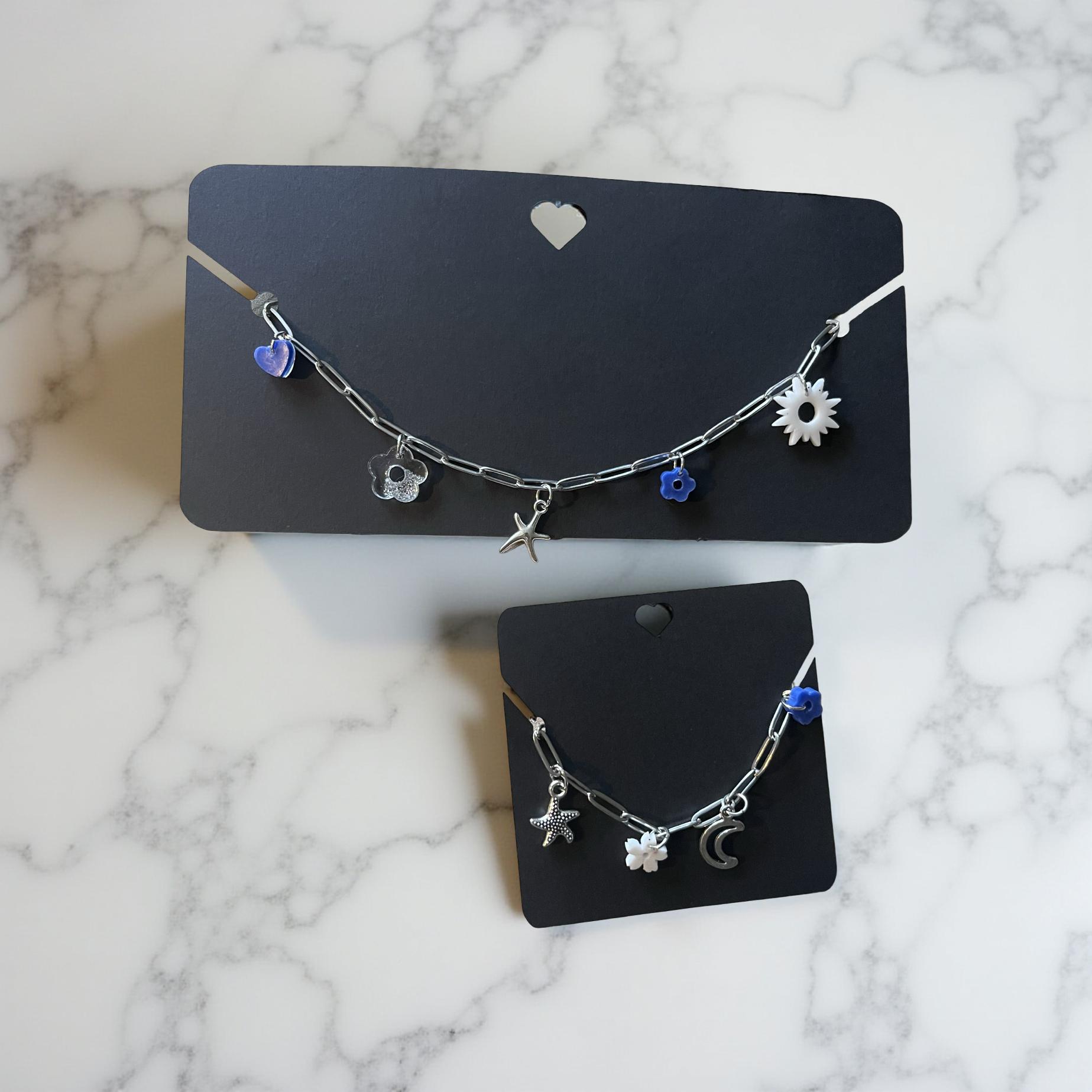 Collier hexagones irréguliers résine effet marbré et acier inoxydable