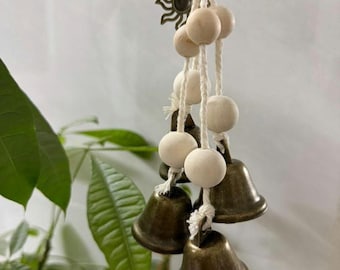 Campana de viento de aleación con forma de estrella y flor de bruja para decoración de puertas de jardín al aire libre