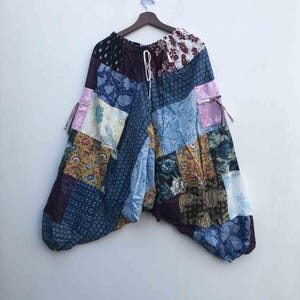 Pantaloni unisex Boho Patchwork Aladdin, pantaloni larghi hippie in cotone patchwork fatti a mano, stile con cavallo basso, pantaloni in cotone Boho.