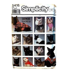 May include: A Simplicity sewing pattern envelope labeled 8416 for catwear and dogwear. The front features twelve photographs of various cats and dogs wearing handmade garments, including plaid coats, collars, and shirts, with text identifying the brand.