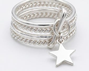 Verstellbarer Stapelring mit Sternanhänger aus Sterlingsilber