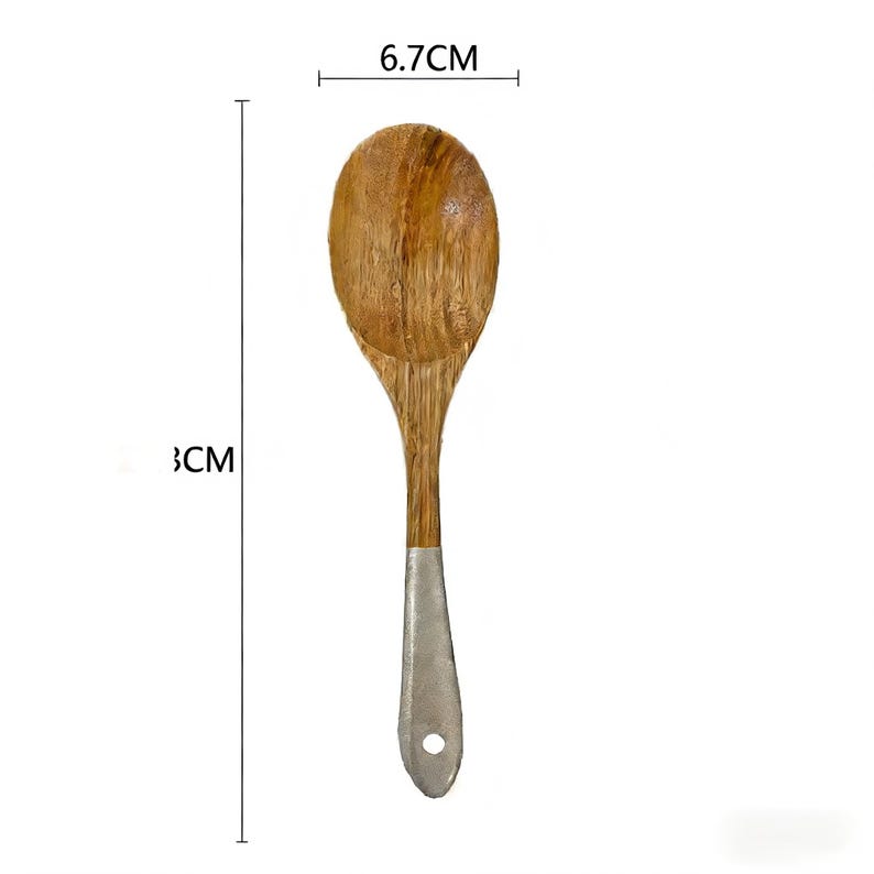 May include: A wooden spoon with a silver-coloured handle. The spoon is 30 cm long and 6.7 cm wide. The spoon is made of light brown wood and has a hole at the end of the handle. Kitchen utensil.