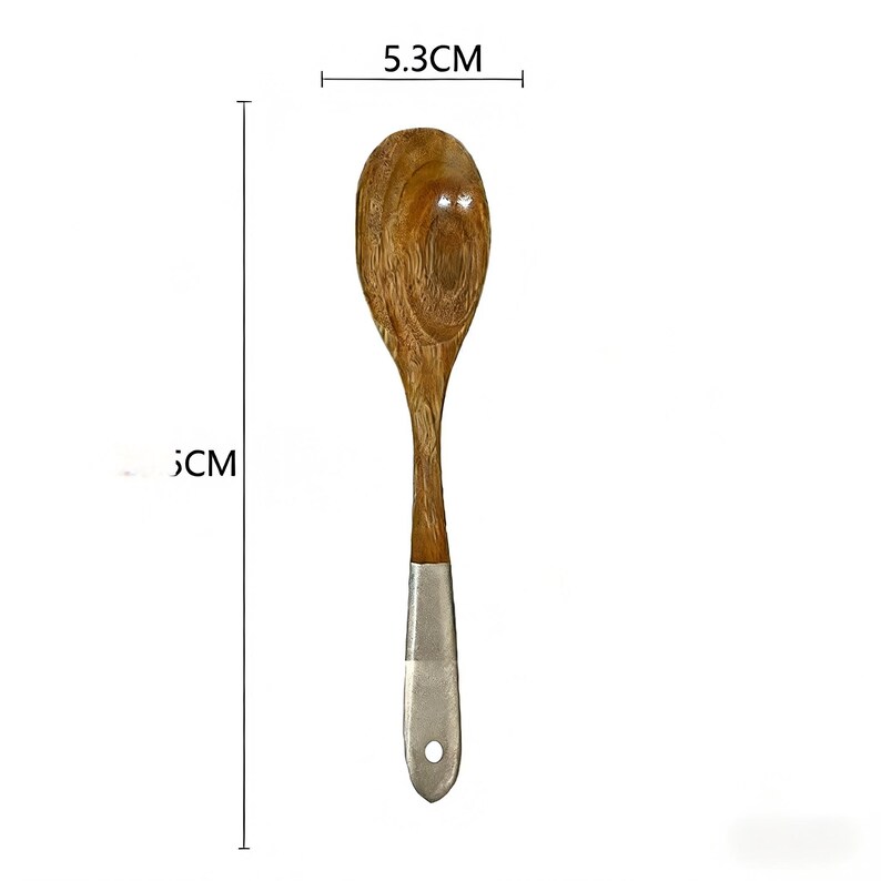 May include: Wooden spoon with a light brown finish and a silver-coloured handle. The spoon is 5.3 cm wide and approximately 35 cm long. The spoon has a hole at the end of the handle.