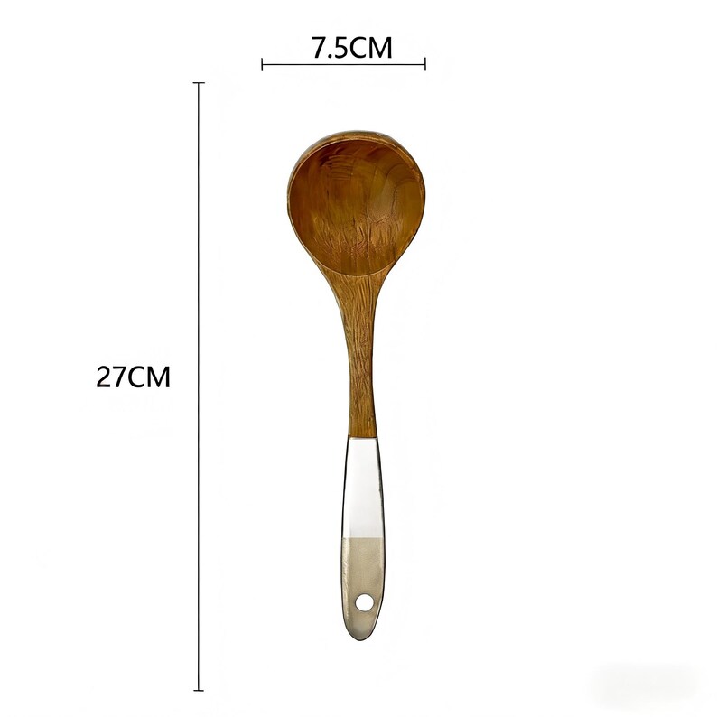 May include: A wooden cooking spoon, 27 cm long, with a 7.5 cm wide bowl. The spoon is made of light brown wood with a handle that has a white and tan accent. The handle has a hole at the end for hanging.
