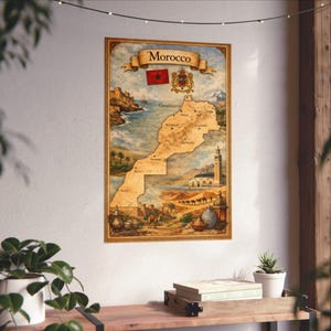 May include: A framed map of Morocco, featuring a detailed illustration of the country's geography and landmarks. The map includes the Moroccan flag, coat of arms, and the word "Morocco" in a banner. The artwork has a vintage, travel-poster style.