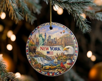 May include: A round ceramic ornament featuring a New York City collage with the Statue of Liberty, a yellow taxi, a bald eagle, a bear, a deer, a lighthouse, and the text NEW YORK with an American flag, suspended by a gold string.