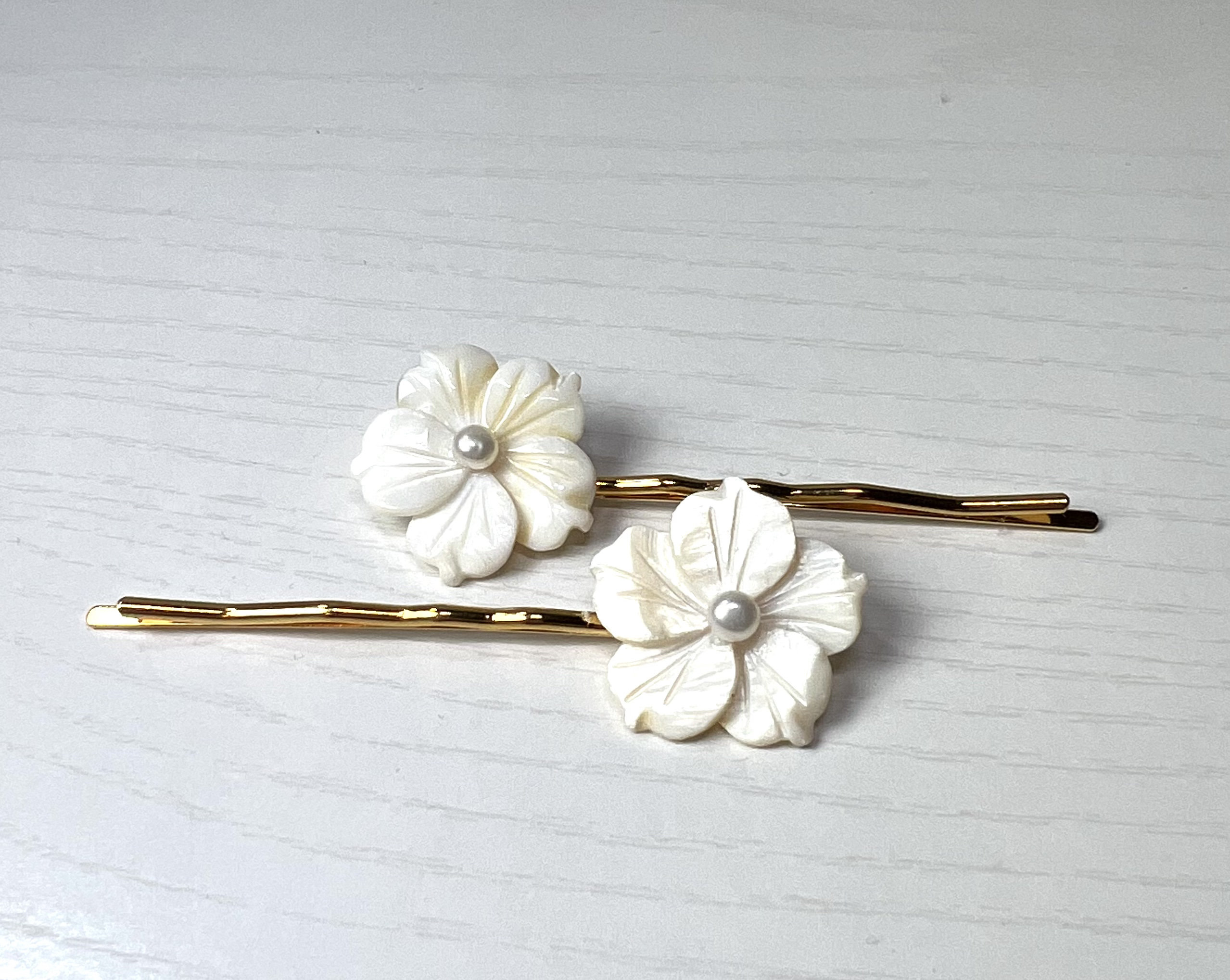 White Mother of Pearl and Cultured Pearl Plumeria Flowers on Gold Hair ...