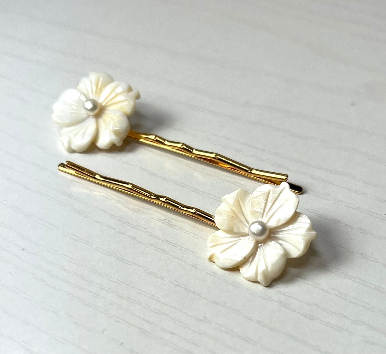 White Mother of Pearl and Cultured Pearl Plumeria Flowers on Gold Hair ...