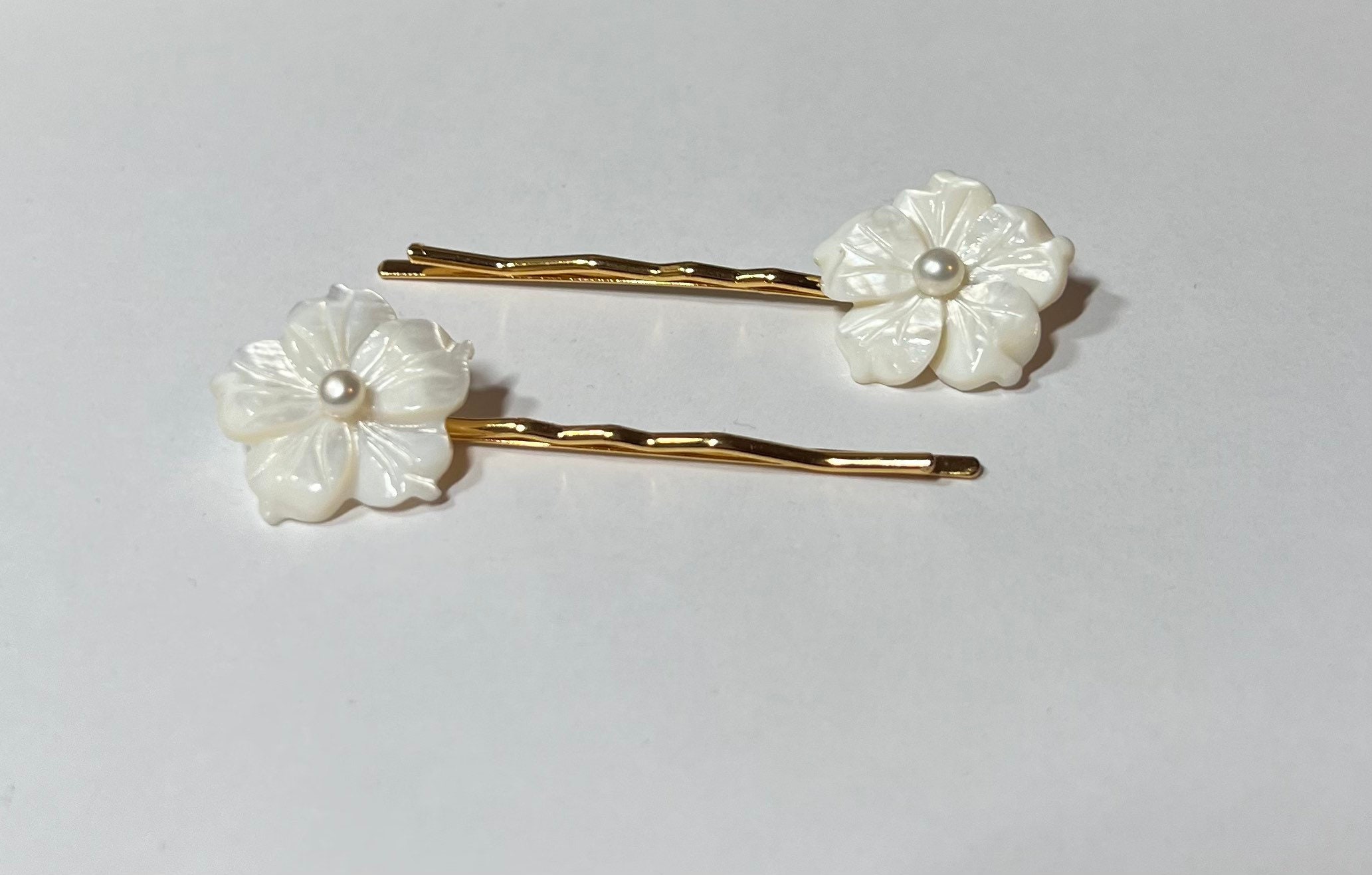 White Mother of Pearl and Cultured Pearl Plumeria Flowers on Gold Hair ...
