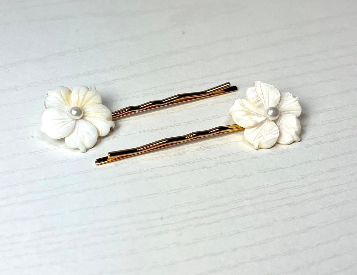 White Mother of Pearl and Cultured Pearl Plumeria Flowers on Gold Hair ...