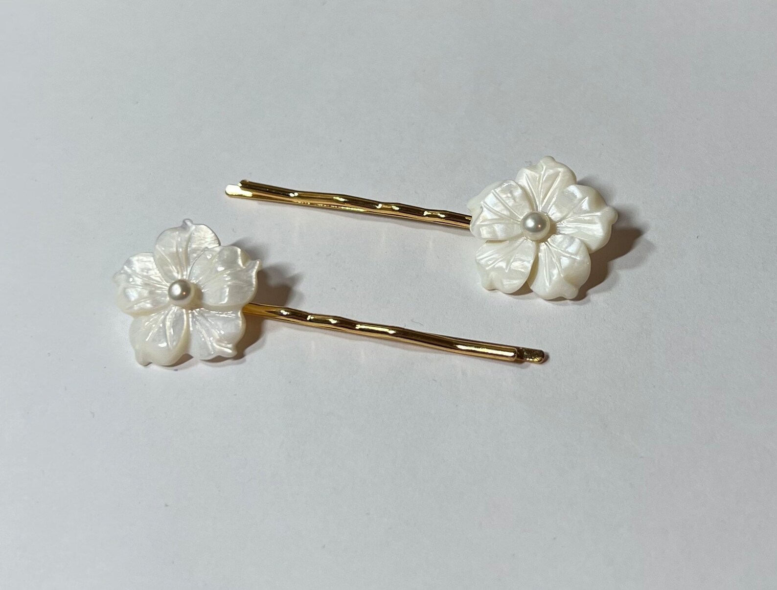 White Mother of Pearl and Cultured Pearl Plumeria Flowers on Gold Hair ...