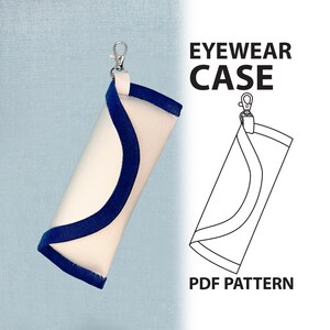 May include: Eyewear case in white with a navy blue trim and a silver clasp. The text "EYEWEAR CASE" is displayed in black. A line drawing of the case and the text "PDF PATTERN" are also shown.