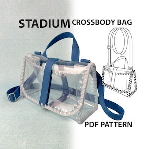 May include: A clear stadium crossbody bag with blue fabric trim and a matching blue adjustable strap. The bag features a top handle and a rectangular shape. A black line drawing of the bag and the text STADIUM CROSSBODY BAG PDF PATTERN are included.
