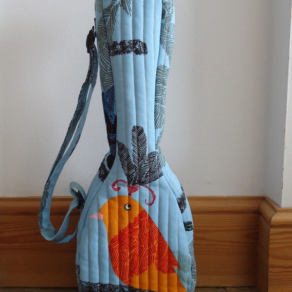 Bird print ukulele gig bag (soprano sized) in light blue.