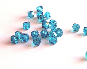 4mm Zircon bicone beads (x24)