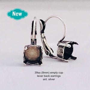 May include: Two antique silver lever back earrings with empty cup settings. The earrings are labeled "New" and feature a square cup design. The text on the image reads "39ss (8mm) empty cup lever back earrings ant. silver."