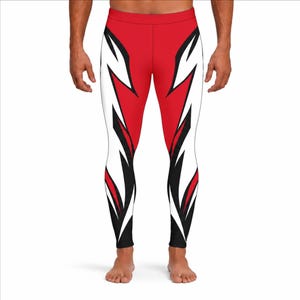 May include: Full-length leggings featuring a vibrant red base colour with bold, sharp-edged graphic patterns in black and white running down the outer sides of each leg. The design includes pointed, angular shapes that create a dynamic visual effect.
