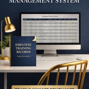 May include: A desk scene with a computer showing an employee training tracker, a navy blue notebook titled "Employee Training Records," and a gold desk lamp. The text "Track & Manage Compliance" is displayed on a banner.
