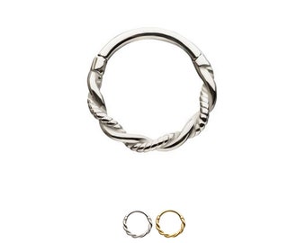 May include: Silver twisted ring with a hinged opening. The ring is shown in two different colors, silver and gold.