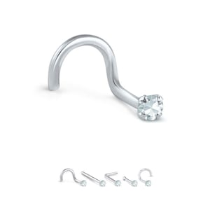 May include: A silver nose ring with a curved post and a clear, square-cut gemstone. The image also shows a selection of similar nose rings in various styles, all featuring a small, clear gemstone.