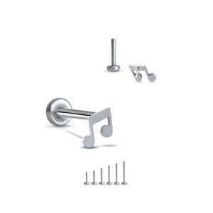May include: Silver-toned musical note lip piercing jewelry. The image shows several pieces, including a flat-backed stud with a musical note design, and several different post lengths. The jewelry is displayed against a white background.