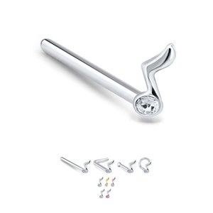 Peut inclure: Bague de nez en argent avec un cristal transparent et un motif de note de musique.