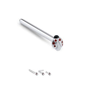 May include: Silver nose ring with a ladybug design. The ladybug is black with red spots.