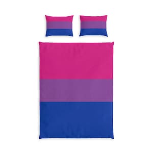 May include: A bedding set consisting of a large rectangular duvet cover and two matching rectangular pillowcases. The fabric features a horizontal tricolour pattern of vibrant pink, purple, and blue stripes, consistent across all three pieces.