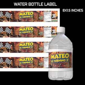 May include: A clear plastic water bottle with a label that reads "MATEO IS TURNING 2". The label also features a race car theme with checkered flags and a desert landscape. The label size is 8x1.5 inches.