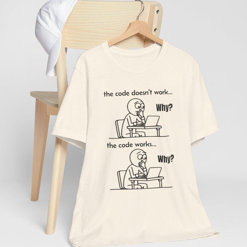 Minimalist comic drawing of a programmer at a desk with a laptop, captioned "the code doesn't work... Why?" and "the code works... Why?" on a light background