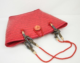 red woven straw bag // metallic cording accents