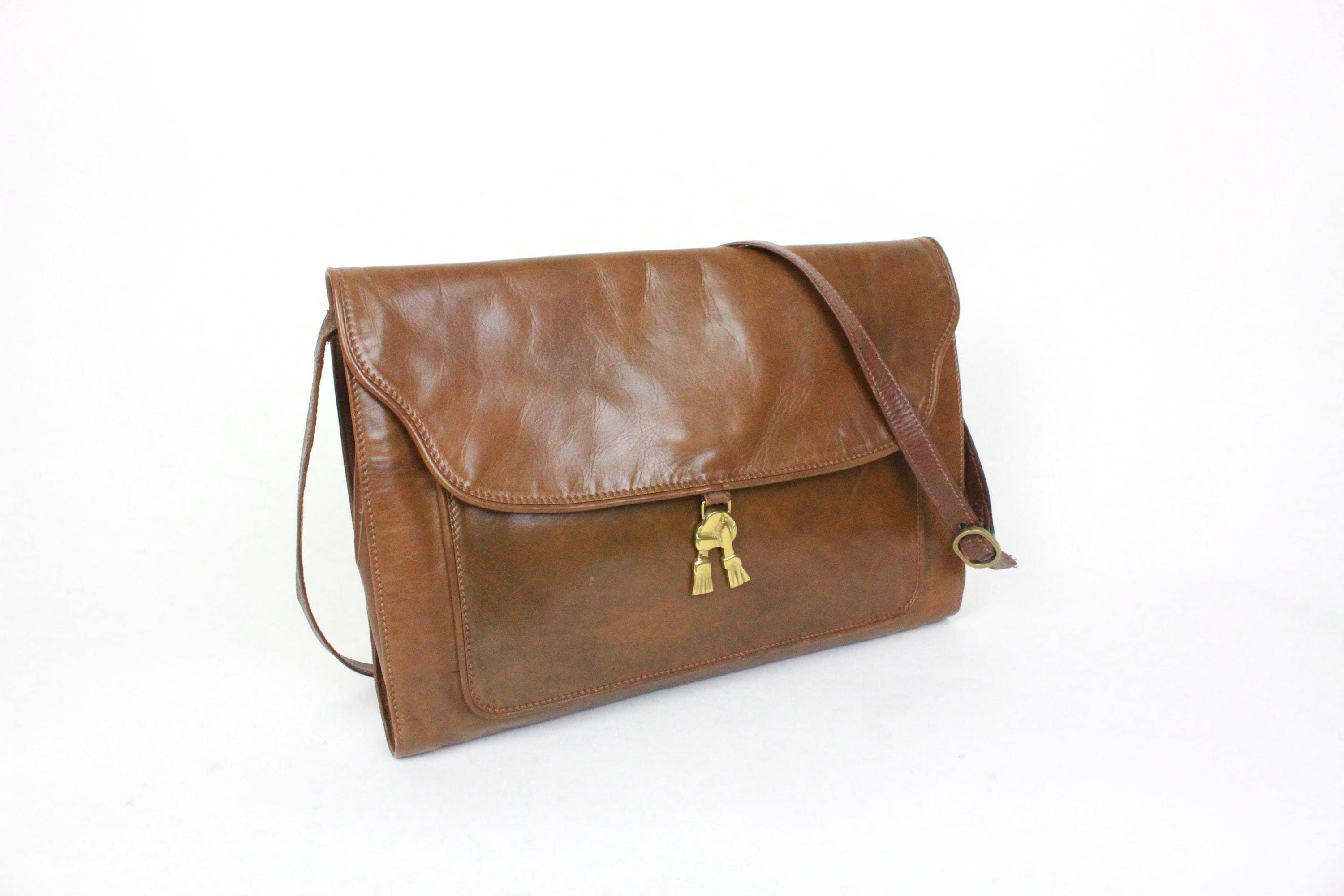 70s 80s leather Mariotti bag // brass tassel detail