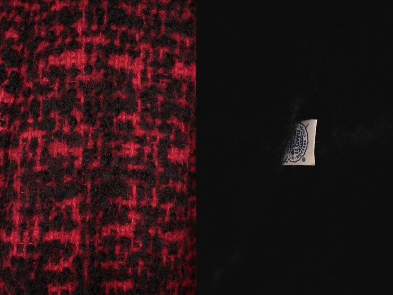 May include: Red and black tweed fabric with a white label that says "The Woolmark Company" in blue lettering.