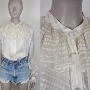 vintage ruffle blouse // sheer sleeves // gold accents