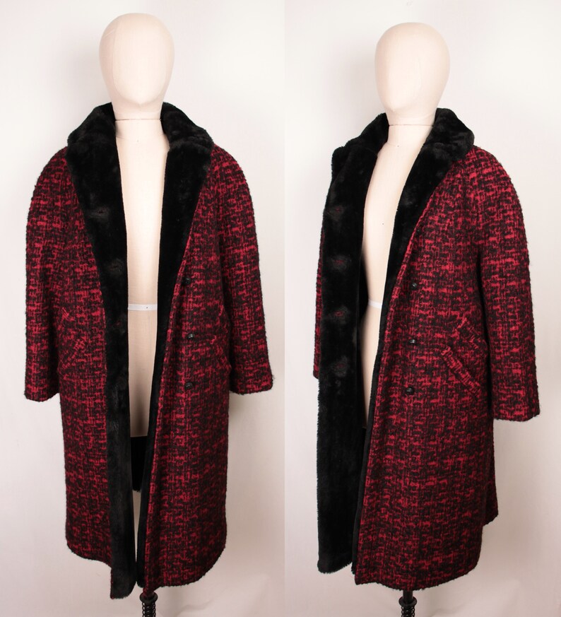 May include: A long red and black tweed coat with a black faux fur collar and lining. The coat has a double breasted closure and two pockets.
