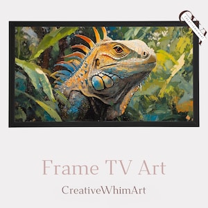 Puede incluir: Una obra de arte enmarcada que presenta una pintura detallada de una iguana en un entorno exuberante y verde. La iguana muestra una mezcla de tonos naranja, azul y amarillo. La obra de arte está enmarcada en un marco rectangular negro. Se muestra el texto "Frame TV Art" y "CreativeWhimArt".
