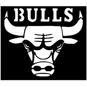 May include: A black and white graphic featuring the word "BULLS" above a stylized bull's head. The bull has large horns, a detailed face, and is set against a solid black background. The design is bold and graphic.