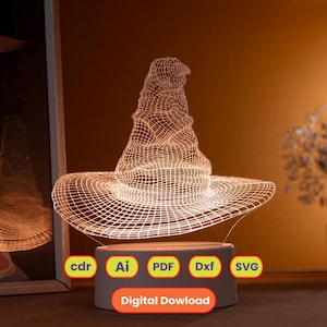 May include: A white ceramic mug with a black handle and the text "But First, Coffee" in a black, handwritten-style font. The mug is on a white surface.