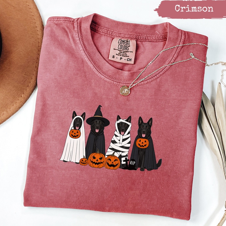 Crimson Comfort Colors t-shirt with four dogs in Halloween costumes and pumpkins.