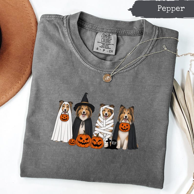 Gray Comfort Colors t-shirt with four dogs in Halloween costumes and pumpkins.