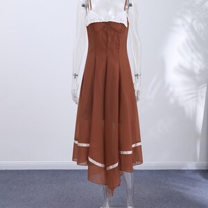 Beach Party Dress | Sleeveless Pleated Long Gown | Summer Wear | Romantic Beach Style

Beach party dress with sleeveless pleated gown shape, flowing long hem, and romantic summer styling.