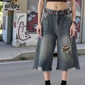 Ripped Denim Jorts | Wide Leg Cropped Pants | Daily Wear | Y2K Streetwear Style

Distressed wide leg denim jorts with ripped knee and vintage Y2K streetwear style
