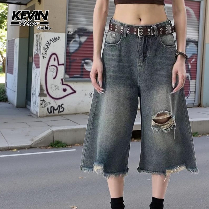 Ripped Denim Jorts | Wide Leg Cropped Pants | Daily Wear | Y2K Streetwear Style

Distressed wide leg denim jorts with ripped knee and vintage Y2K streetwear style