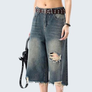 Ripped Denim Jorts | Wide Leg Cropped Pants | Daily Wear | Y2K Streetwear Style

Distressed wide leg denim jorts with ripped knee and vintage Y2K streetwear style